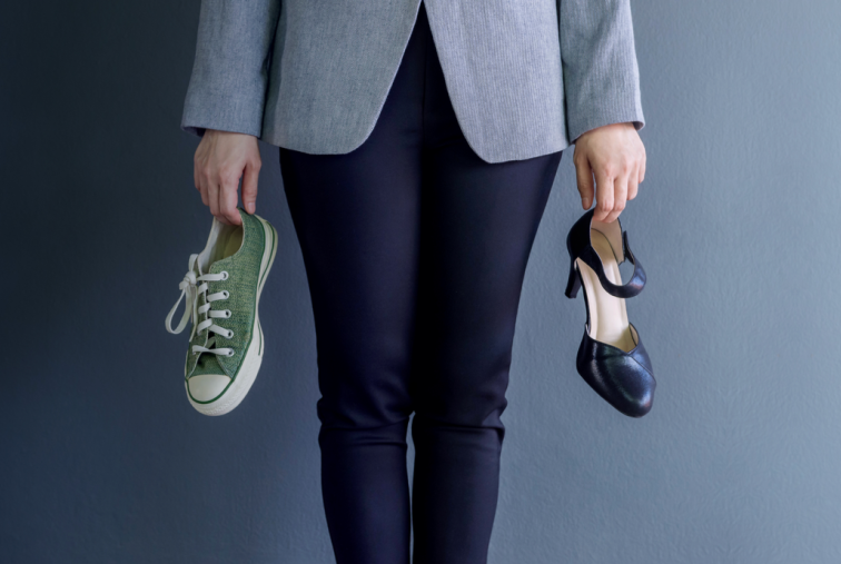 Woman Holding Shoes